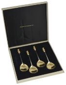 A set of contemporary four silver and silver gilt seal top apostle spoons, hallmarked London 1972