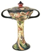 A contemporary Moorcroft Emma Bossons 'Symphony' twin handled bonbonniere with cover, circa 2003