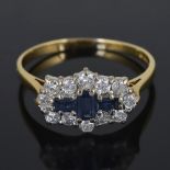 A baguette sapphire and diamond set fancy cluster ring