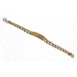 A contemporary 9ct gold curb link identity bracelet,