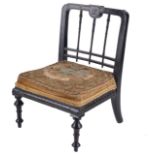 A Victorian ebonised doll's chair,