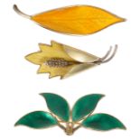 Three Scandinavian signed silver gilt and enamel brooches,