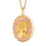 A large contemporary gold and diamond cameo style portrait pendant mounted on rose quartz