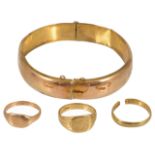 A 9ct gold hinged bangle