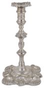 A George II silver taper stick, hallmarked London 1746 - 1753