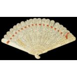 A carved late 19th century Chinese ivory fan