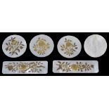 Six Chinese export mother of pearl and gilt decorated counters