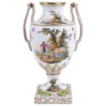 A late 19th century Continental twin handled porcelain urn