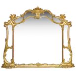 An Italian style giltwood overmantel mirror, 19th century