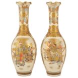 A pair of late 19th century Japanese Satsuma vases of slender neck baluster form,