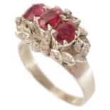 A Continental three stone ruby and diamond set cocktail cluster ring,