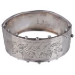 A Victorian silver hinged bangle