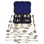 A collection of cased and loose silver spoons,
