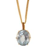 A large contemporary oval blue gem set pendant on chain