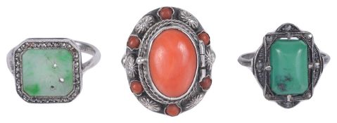 An Art Deco pierced octagonal jade silver mounted ringhaving marcasite set border, together with a