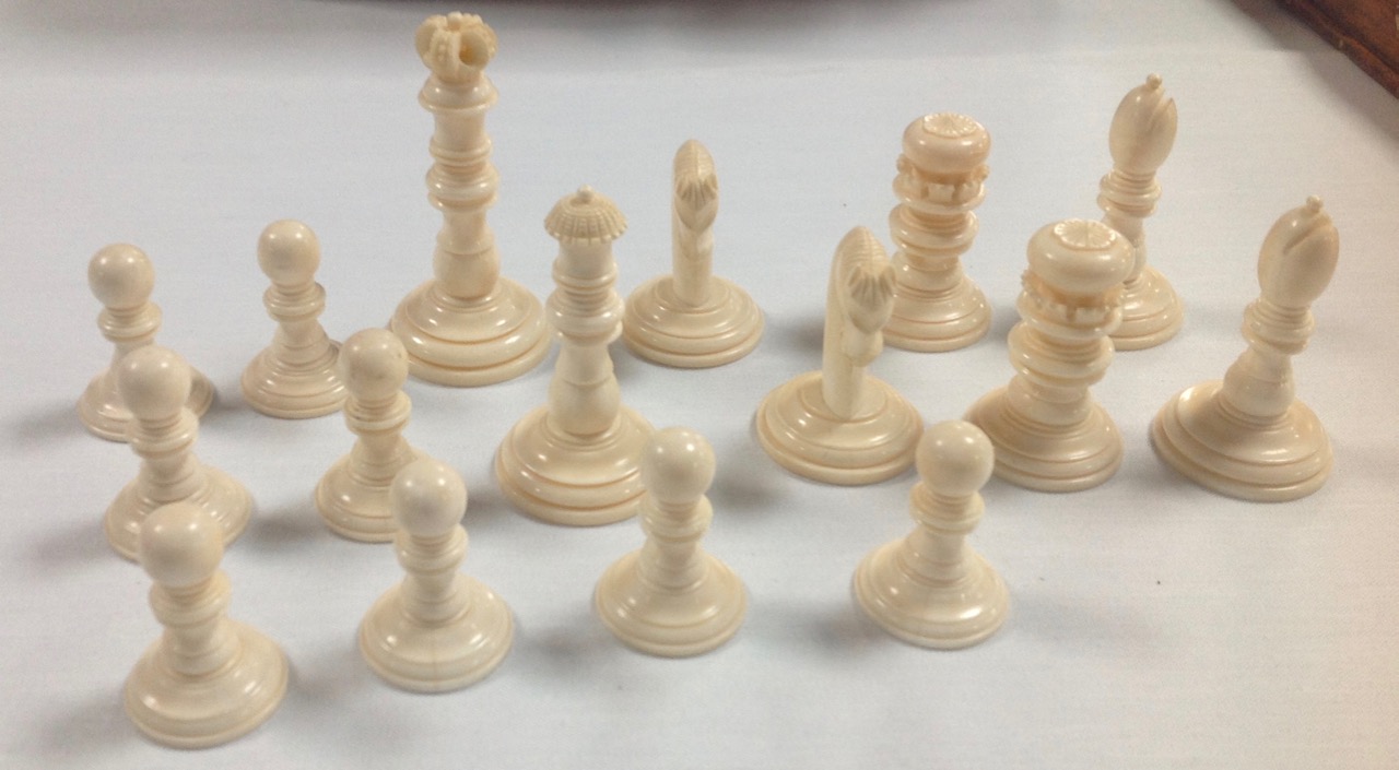A late 19th/early 20th century coromandel and ivory chess set and later boardthe turned ivory and - Image 5 of 13