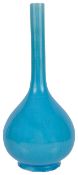 A 19th century Japanese turquoise glazed monochrome vaseof slender necked bottle formheight