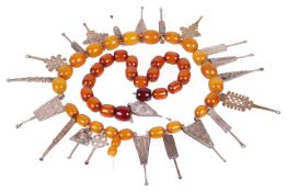 A large and impressive Ethiopian tribal necklacethe beads inter-spaced with a mixed collection of