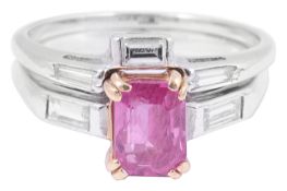 An unusual contemporary ruby and diamond two section ringthe main ring set with an emerald cut