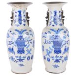 A pair of large late 19th century Chinese blue and white porcelain floor standing vases,the baluster