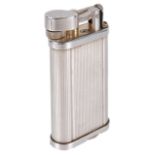 A Dunhill 'Unique' lighterof typical form with ribbed body, no.396046height: 6.4cmCondition: Good