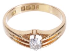 A Victorian single stone diamond ring,the old cut diamond approximately 0.20ct and of slightly ovoid