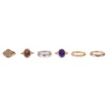A collection of six various 18ct and 9ct gold rings. including an 18ct white gold textured band, a