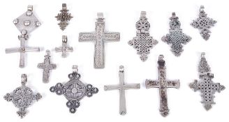 A collection of Ethiopian antique and later Coptic crossessome of hinged construction and pierced in