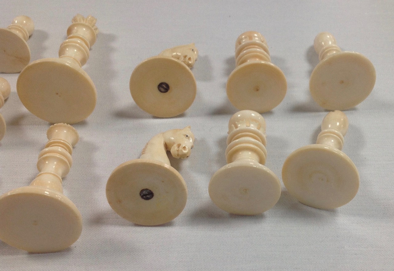 A late 19th/early 20th century coromandel and ivory chess set and later boardthe turned ivory and - Image 9 of 13