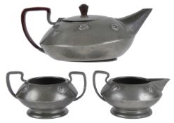 An Arts and Crafts Warric pewter three piece tea servicethe teapot, twin handled sugar basin and