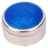 A continental white metal and blue guilloche pill boxthe screw top circular box stamped on the