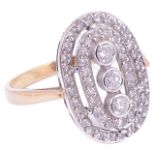 An attractive Art Deco style diamond set ringhaving three central line set diamonds, within two