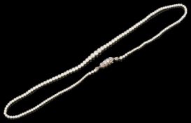 A delicate antique single row pearl necklace with Russian diamond claspthe pearls (untested) and