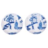 A pair of Chinese Kangxi blue and white porcelain dishescirca 1700each decorated with figures in a