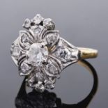 A 1940's diamond set fancy floral cluster cocktail ringthe central diamond approximately 0.50ct