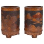 A pair of early 20th century Chinese bamboo brush potsthe cylindrical pots carved in relief with