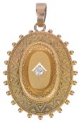 A Victorian Etruscan style diamond set oval pendant locketthe yellow metal pendant with thread and