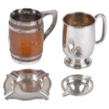 A Contemporary silver tankard, hallmarked Sheffield 1951 of typical form with rounded handled upon