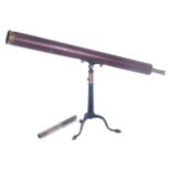 A late 19th/early 20th century 2 3/4 -inch refracting telescope by Newton & Cothe leather bound body