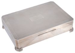 An Art Deco style silver cigarette box, hallmarked Birmingham 1970of canted rectangular form with