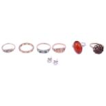 A garnet set tower ring and various related itemsincluding a hard stone silver mounted ring, a