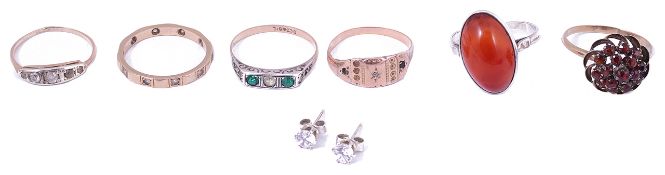 A garnet set tower ring and various related itemsincluding a hard stone silver mounted ring, a