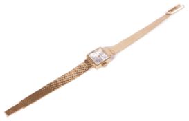 An 18k gold F Bart ladies wristwatch, the dial with baton hours and shaped hands, in a square case