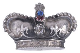 A small Victorian silver and paste set crown broochthe stones set in a central line and with bead