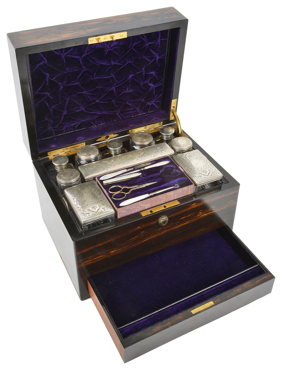 A Victorian coromandel silver ladies' travelling vanity casethe simple rectangular case opening to