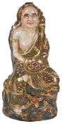 A Japanese satsuma figure of a Buddha converted to a lampthe seated Buddha on rocky base, painted in