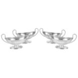 A set of four Victorian silver salts, hallmarked London 1895the twin handled navette shaped pedestal