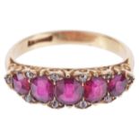 An attractive Victorian style five stone ruby and diamond half hoop ringthe slightly graduated