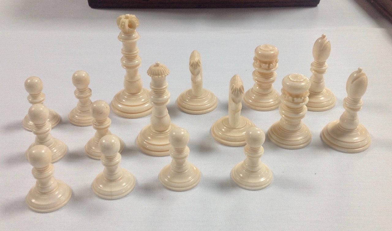 A late 19th/early 20th century coromandel and ivory chess set and later boardthe turned ivory and - Image 6 of 13