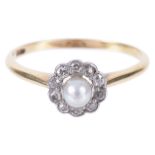A delicate Edwardian pearl and diamond 'daisy' cluster ring,having central set pearl within a